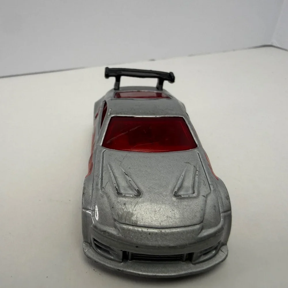 Hot Wheels Nissan 350Z Silver Flame Graphics Diecast Car 1/64 Scale 2006 E05